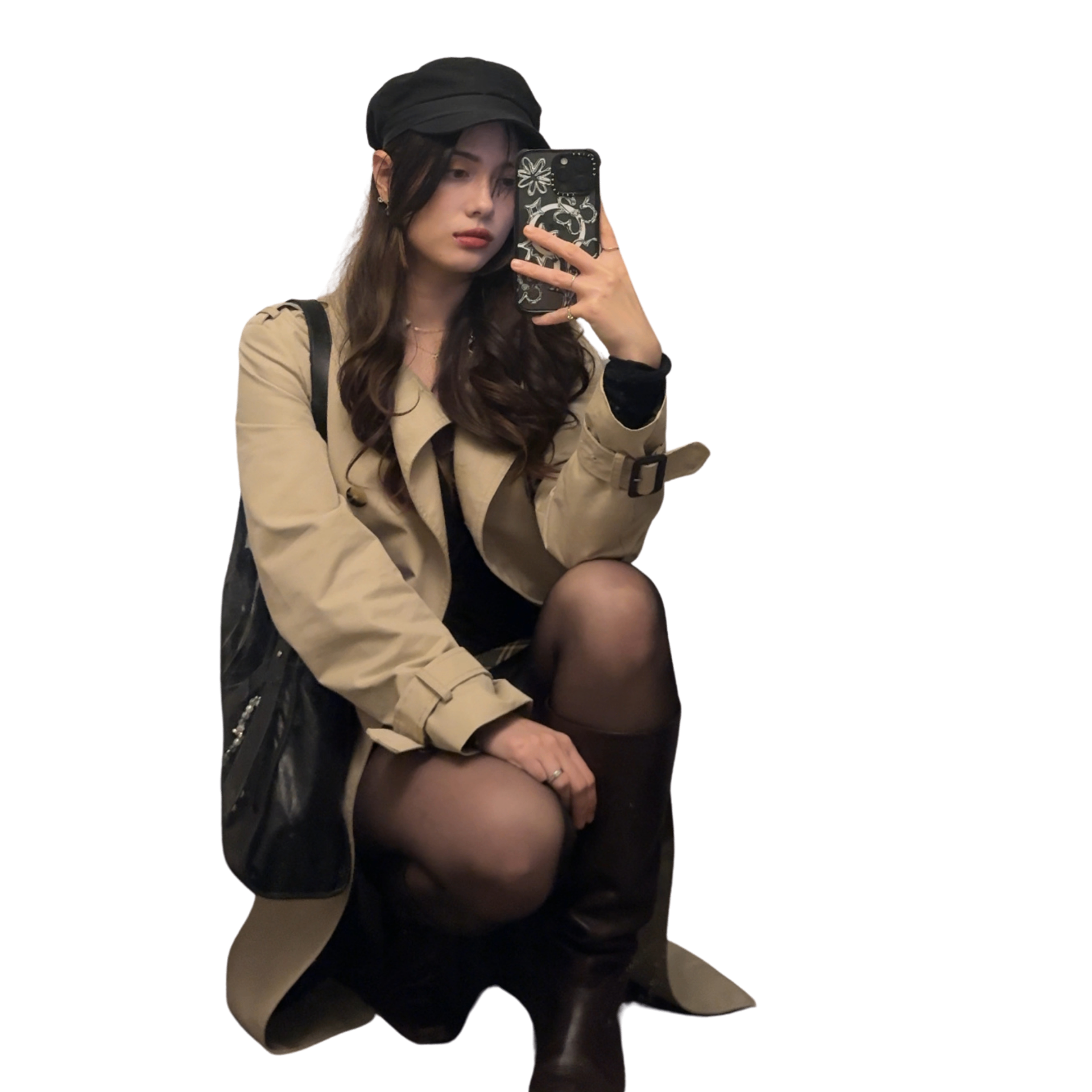Founder of Enchanté in a trench coat